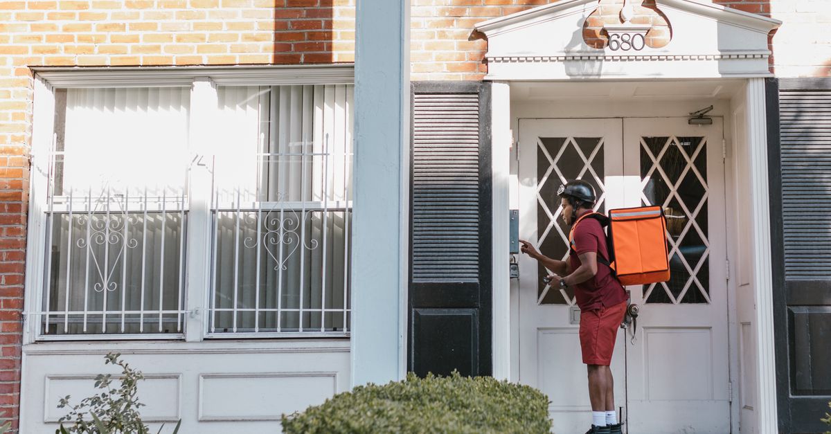 locksmith unlocking front door — Hinsdale Locksmith Brothers