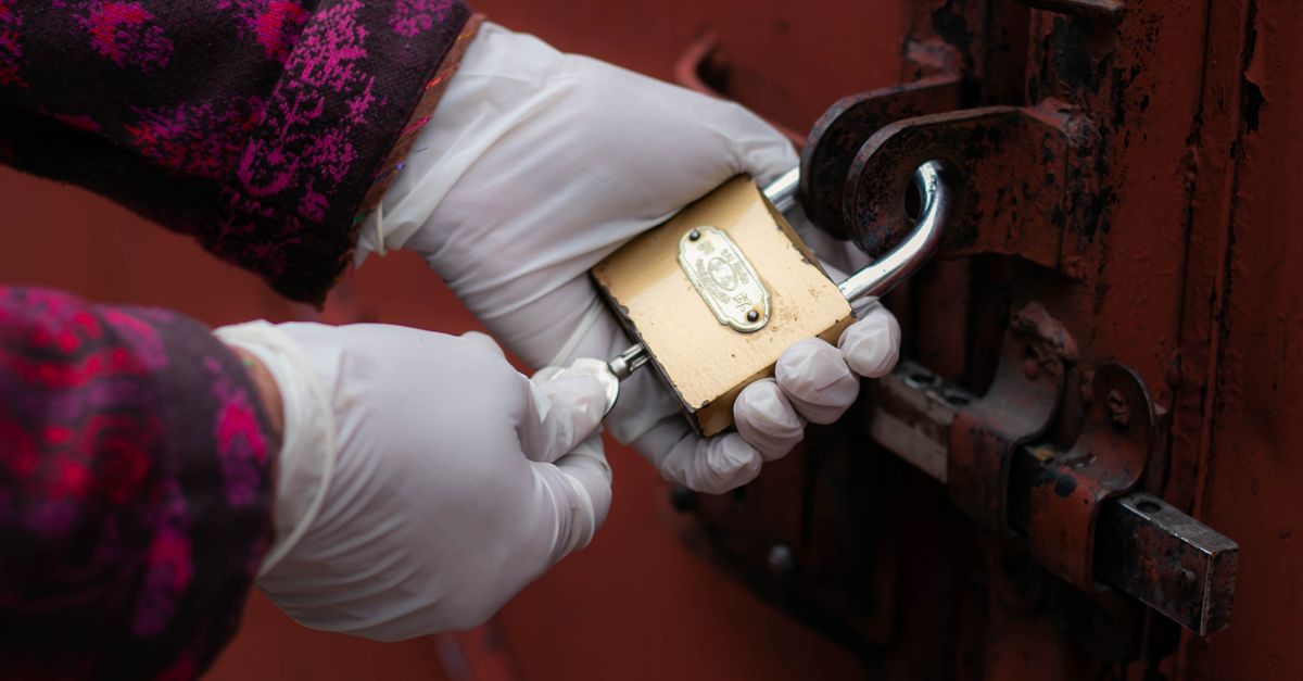 locksmith unlocking front door — Hinsdale Locksmith Brothers